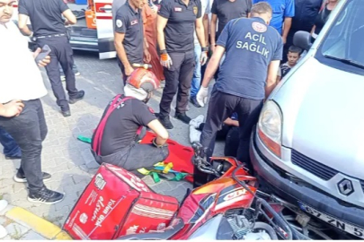 Kurye aracın altında kaldı!