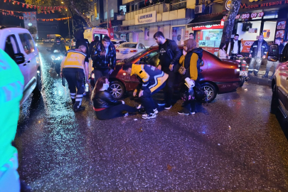 Kadın motorsiklet sürücüsünü kaskı kurtardı!