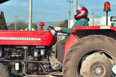 Kaskını takıp Traktörünü sürdü!
