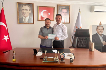 Erol Kanca, Cumhurbaşkanı Erdoğan’ın teşekkür belgesini teslim aldı